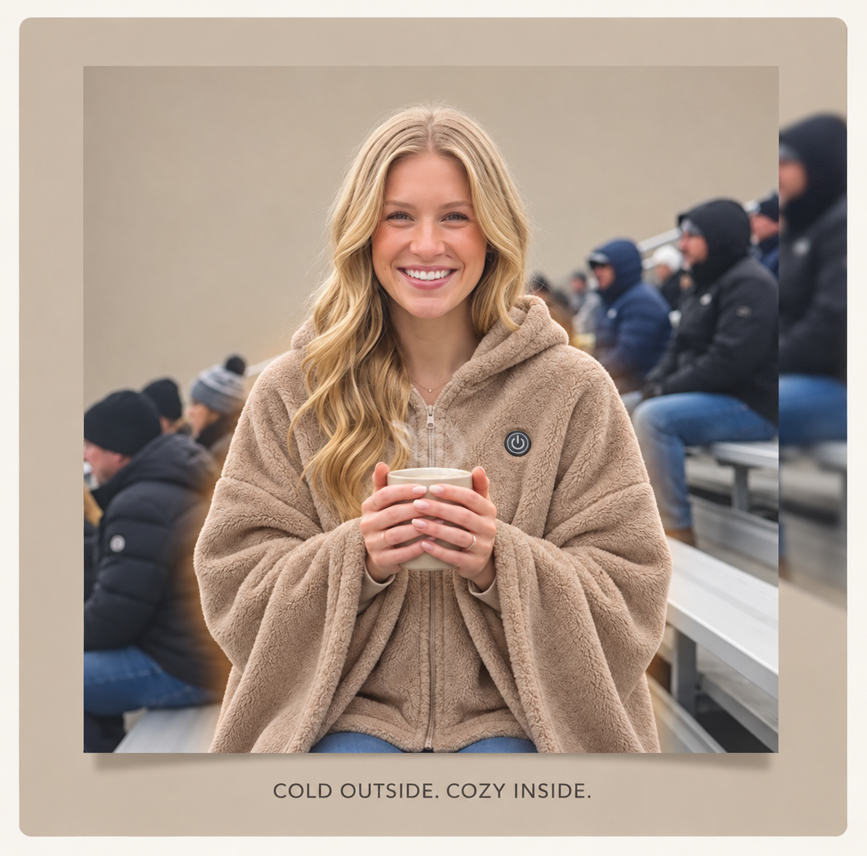 Woman wearing a cozy heated blanket at an outdoor event